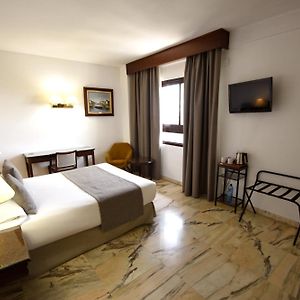 Habitación Estándar con Cama Queen